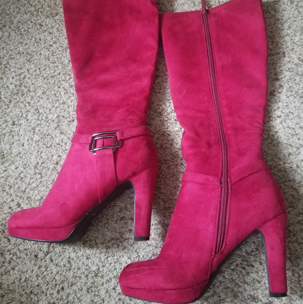 Knee high boots with heels.